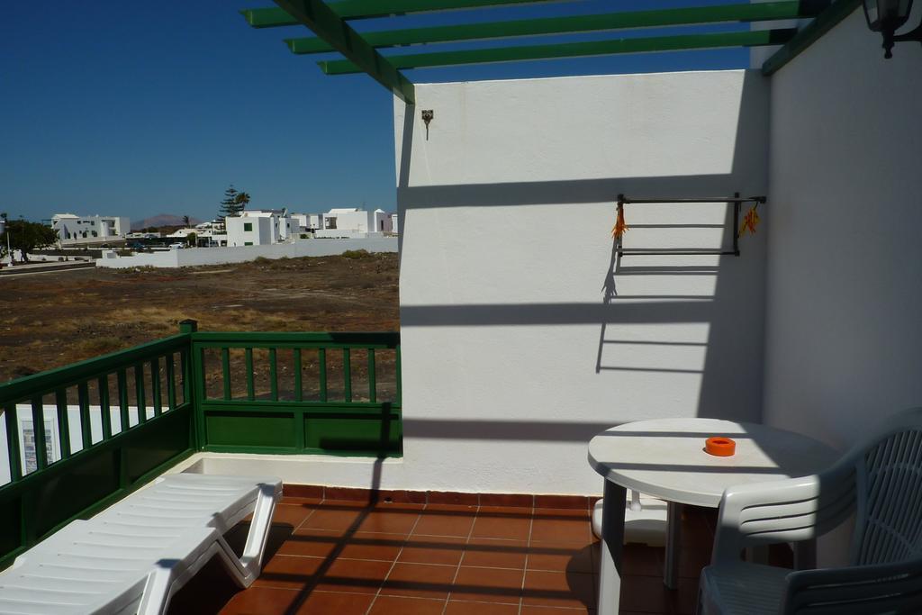 Alhambra Apartamentos Тиас Экстерьер фото