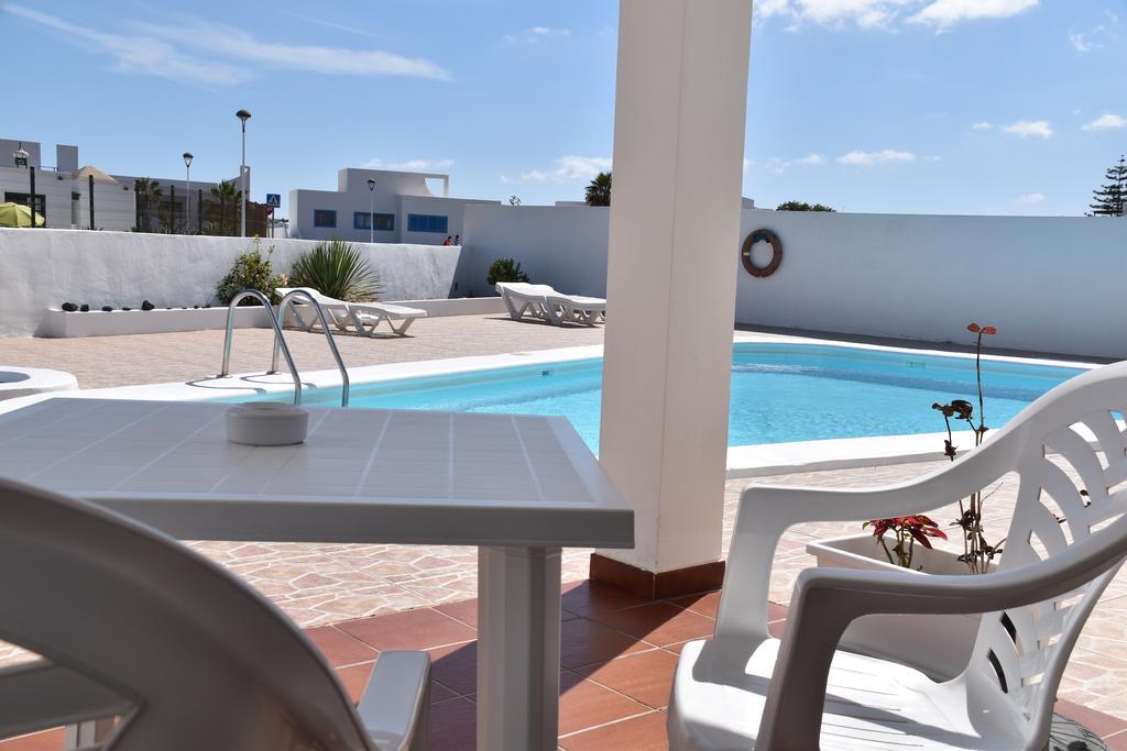 Alhambra Apartamentos Тиас Экстерьер фото